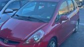 Red 2008 Honda Fit hatchback automatic For Sale